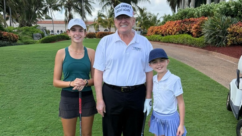 Kai Trump, Donald Trump, and Chloe Trump pose together (2024)