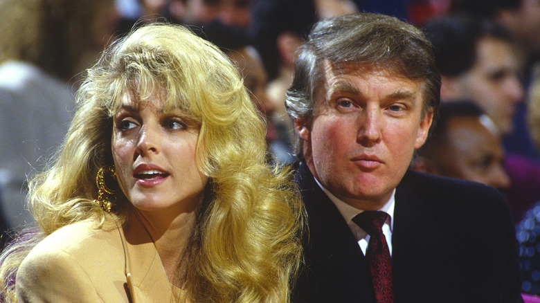 Marla Maples and Donald Trump watch a New York Knicks NBA game in 1993 at Madison Square Garden in Manhattan, New York City (1993)