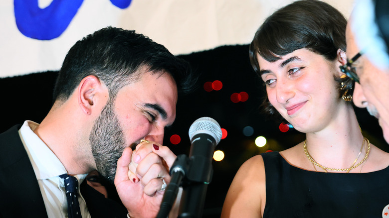 Zohran Mamdani kissing Rama Duwaji's hand