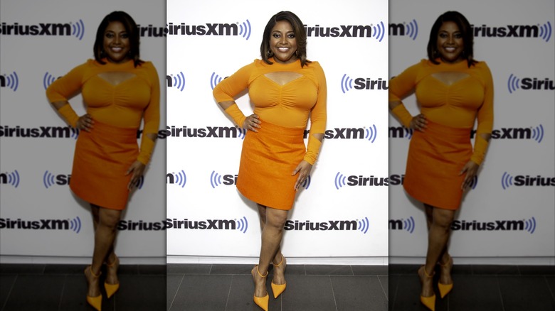 Sherri Shepherd posing at SiriusXM place