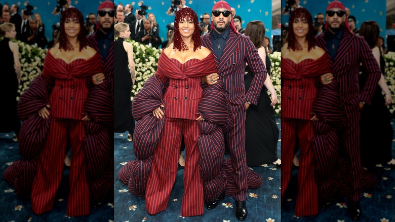 (l-r): Alicia Keys and Swizz Beatz posing arm-in-arm at the 2025 Met Gala