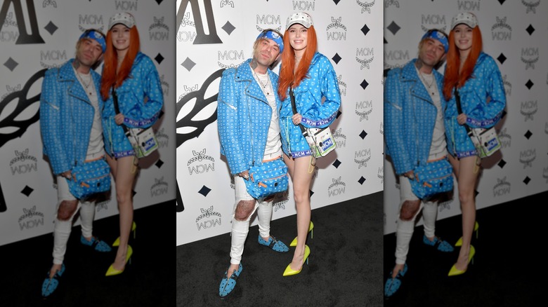 (l-r): Mod Sun and Bella Thorne posing at clothing brand MCM's event