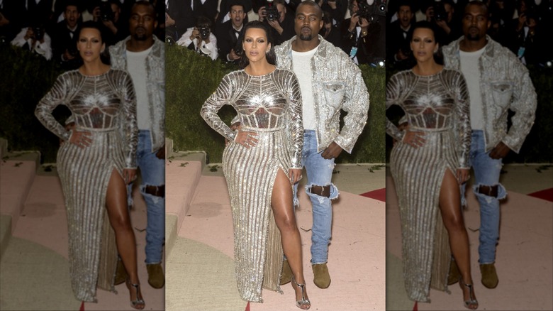 (l-r): Kim Kardashian and Kanye West posing together at the 2016 Met Gala.