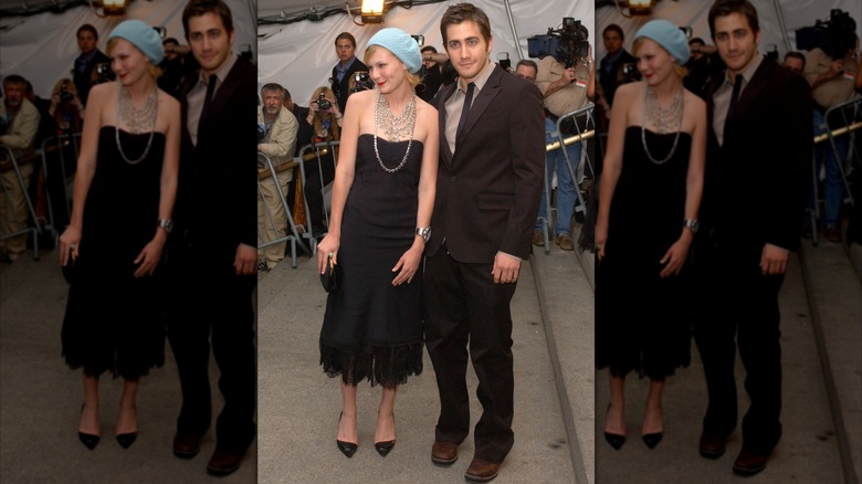 (l-r): Kirsten Dunst and Jake Gyllenhaal posing at the Met Gala