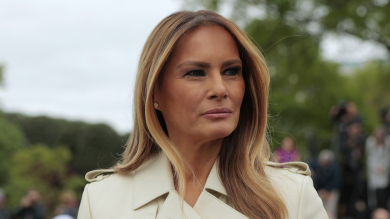 Melania Trump smiling at the 2025 White House Easter Egg Roll