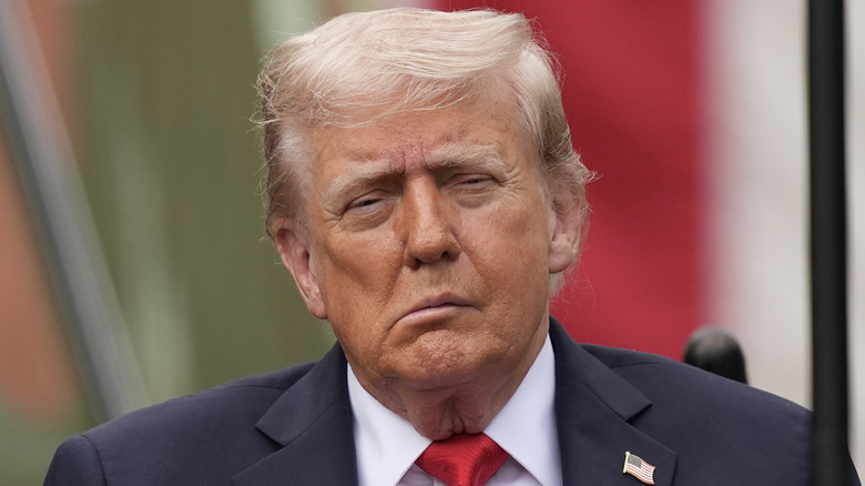 Close-up on Donald Trump with a half drooping face