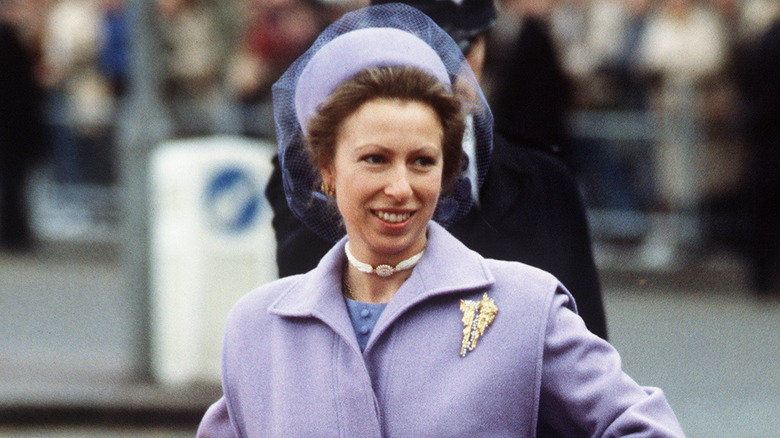 Princess Anne in purple coat