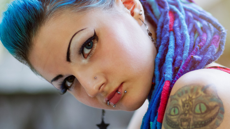 girl with piercing and tattoos