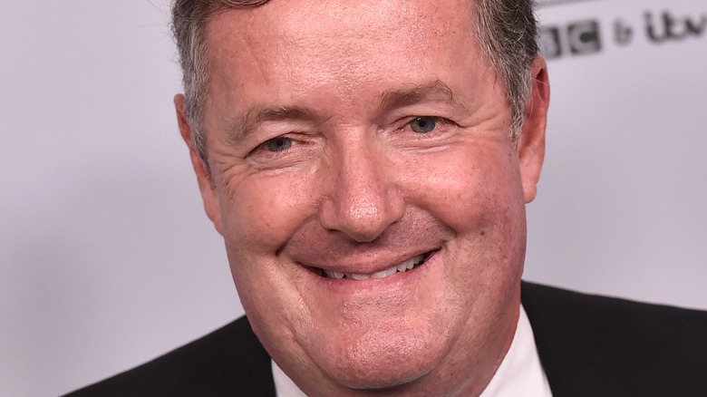 Piers Morgan grinning