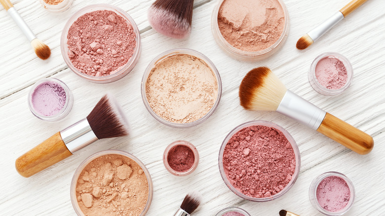 Makeup powders and brushes