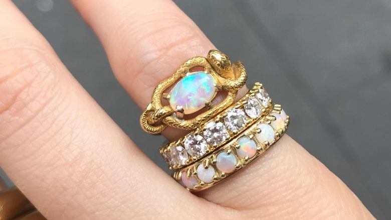 Pinky rings with opal, diamond