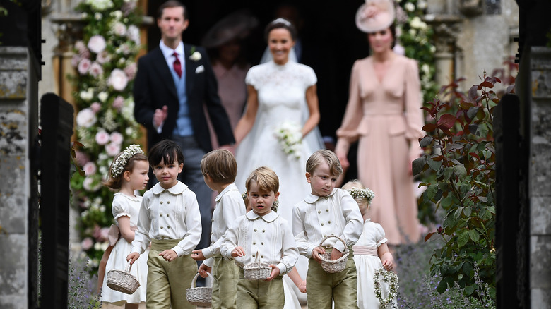 Pippa Middleton at her wedding with Prince George