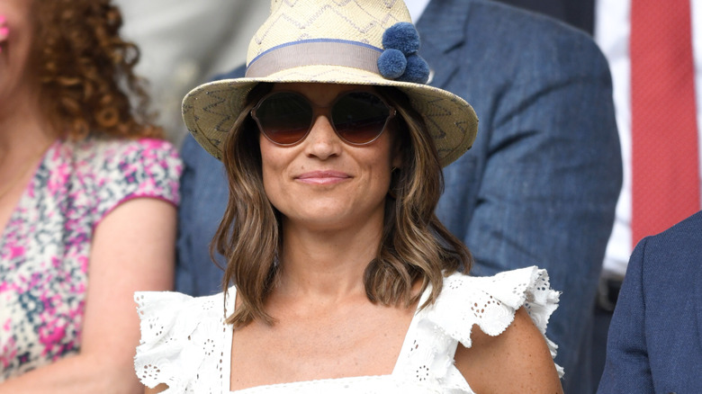 Pippa Middleton smiling and wearing sunglasses
