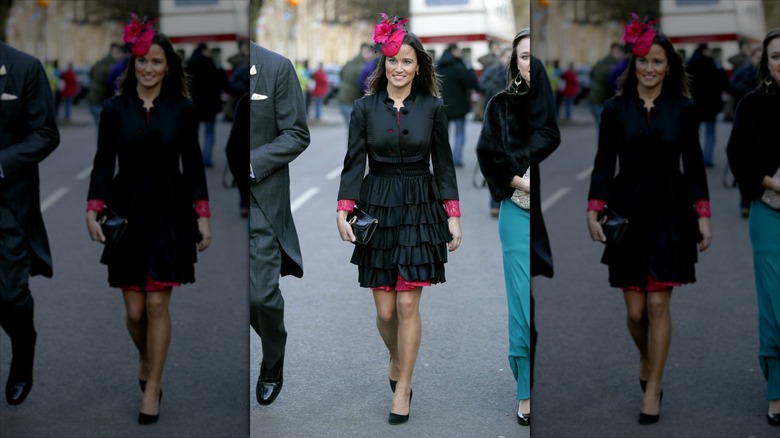 Pippa Middleton in a black ruffled jacket and pink feathery hat.