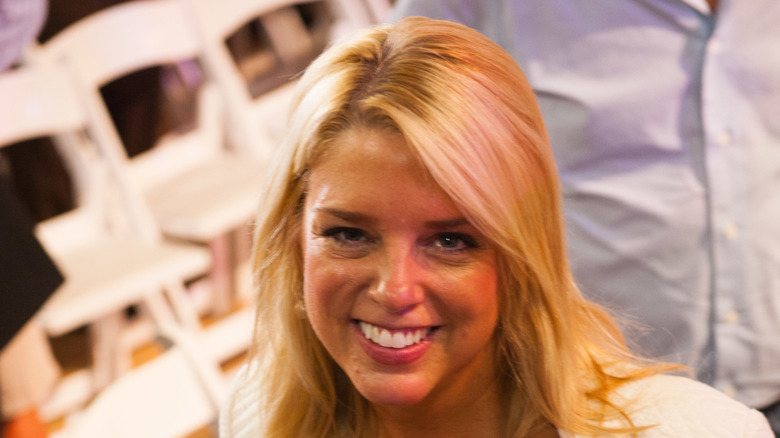 Pam Bondi smiling at an event in 2016