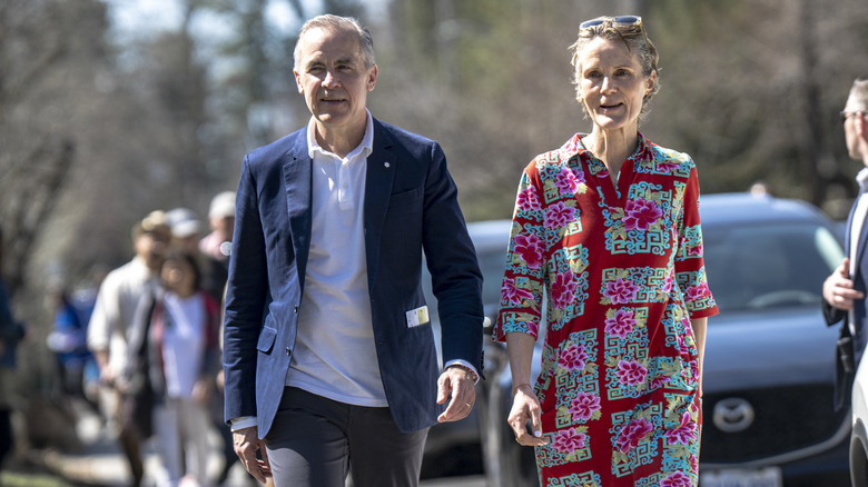 Mark Carney and Diana Carney on a walk
