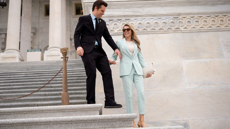 Matt Gaetz and Ginger Gaetz walking on Capitol Hill