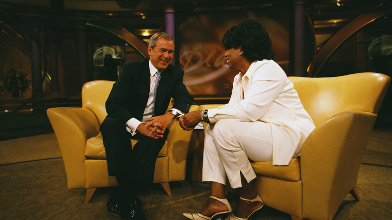 George W. Bush on stage with Oprah Winfrey