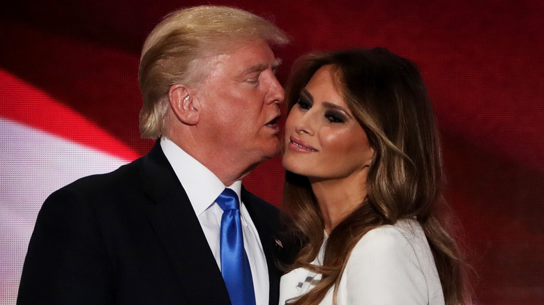 Donald Trump about to kiss Melania Trump on the cheek