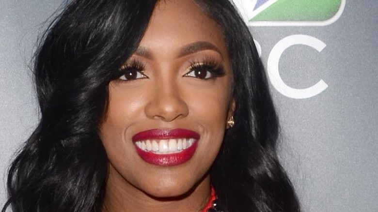 Porsha Williams smiles on the red carpet