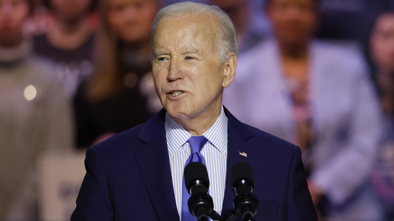 President Joe Biden speaking in blue tie