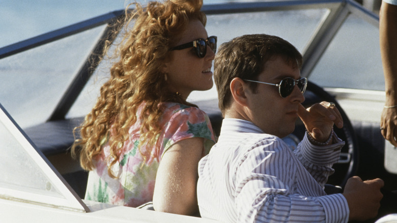 Sarah Ferguson and former Prince Andrew looking outward on a boat