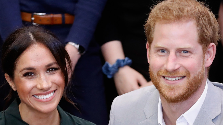 Prince Harry and Meghan Markle smiling 