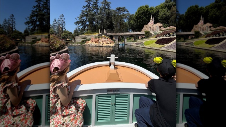 Archie and Lillibet wearing Mickey Mouse ears on a boat