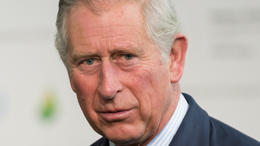 Prince Charles looking somber