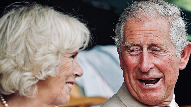 Prince Charles smiling at Camilla Parker-Bowles