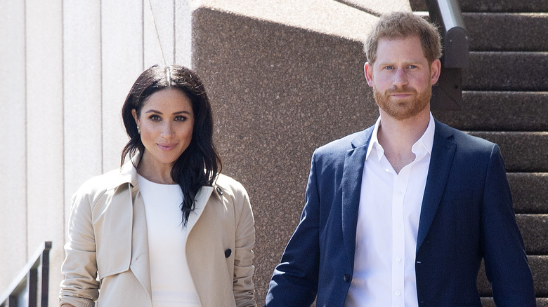 Meghan Markle and Prince Harry holding hands