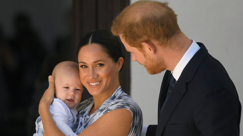 Meghan Markle, Prince Harry and baby Archie outside