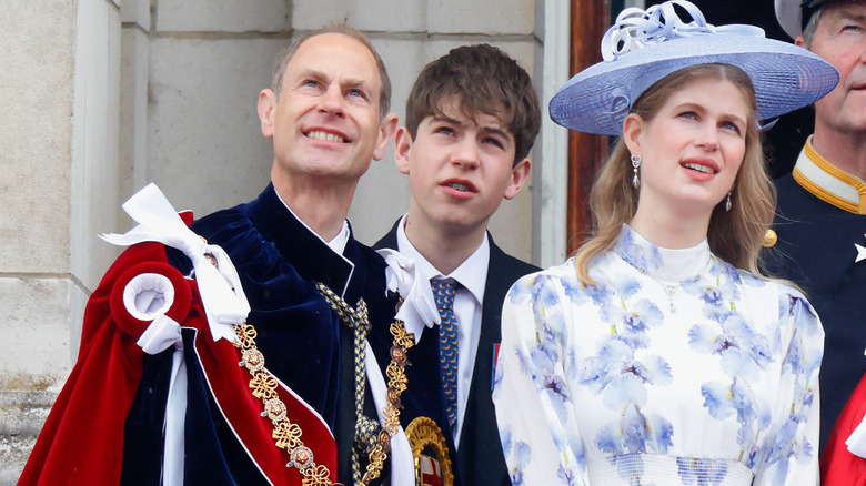 Prince Edward standing with James, Earl of Wessex and Lady Louise Windsor