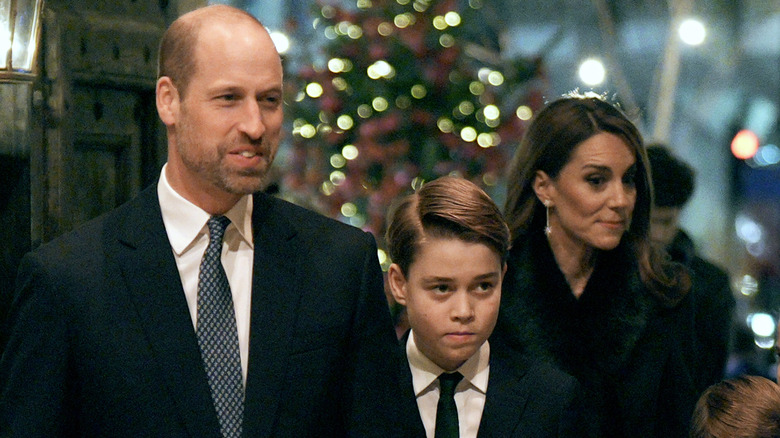Prince William walking with Prince George and Kate Middleton