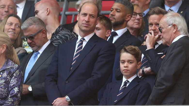 Prince William and Prince George in a crowd