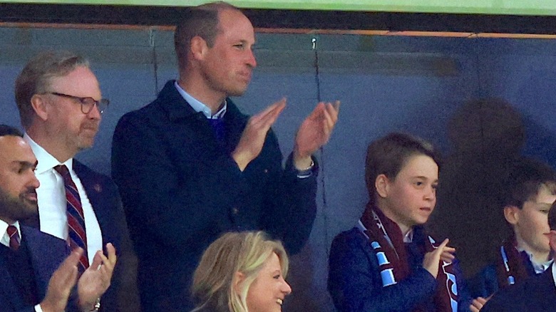 Prince William and Prince George at soccer match