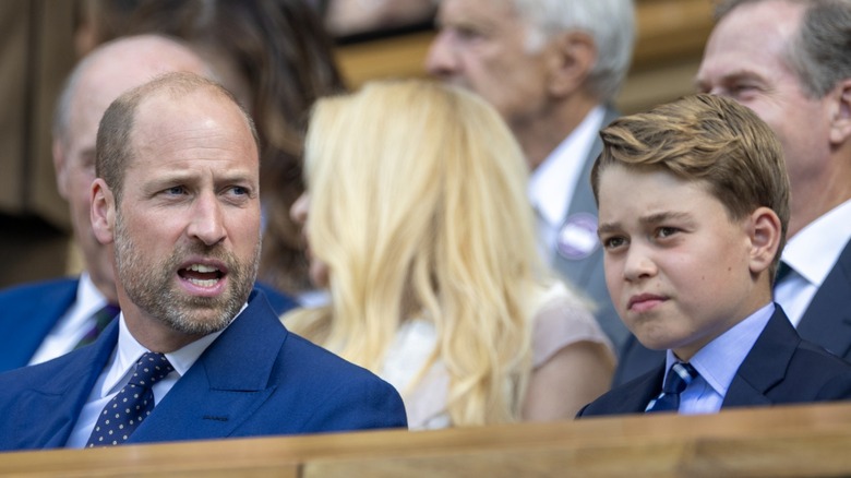 Prince William sitting with Prince George at Wimbledon 2025
