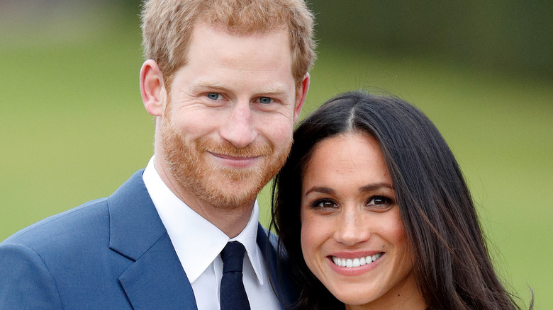 Prince Harry and Meghan Markle posing 