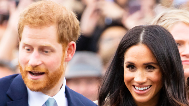 Meghan and Harry look shocked 