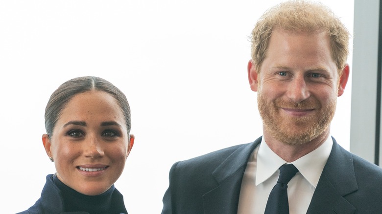 Prince Harry and Meghan Markle smiling