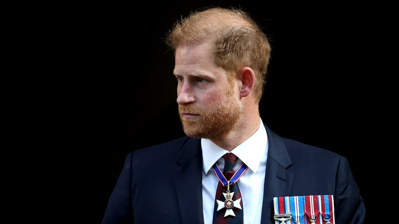 Prince Harry frowning