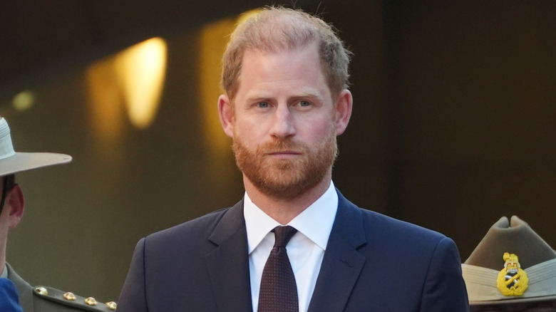 Prince Harry frowning
