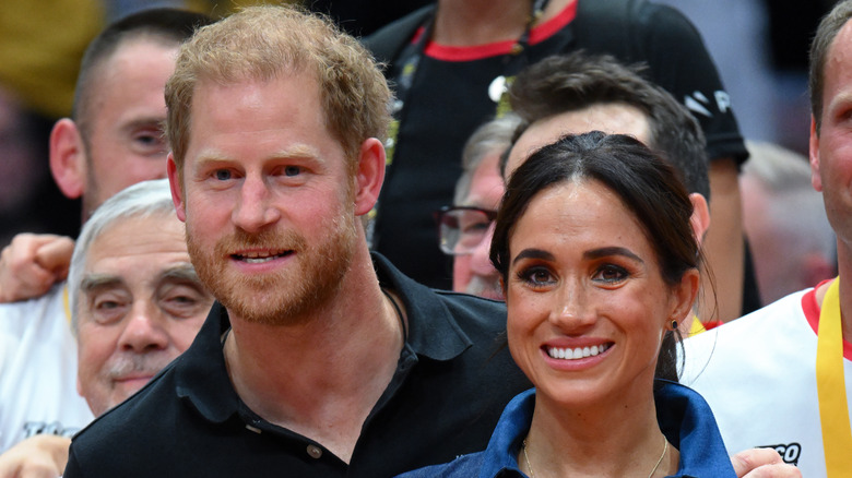 Prince Harry and Meghan Markle smiling