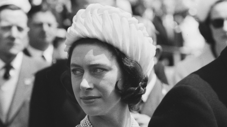 Margaret stares into the distance