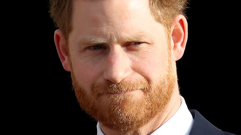 Prince Harry looks disgruntled