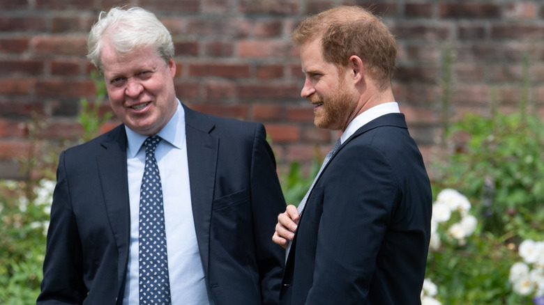 Prince Harry speaking with Charles, Earl of Spencer