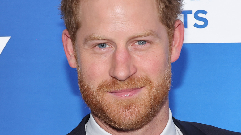 Prince Harry smiling at an event