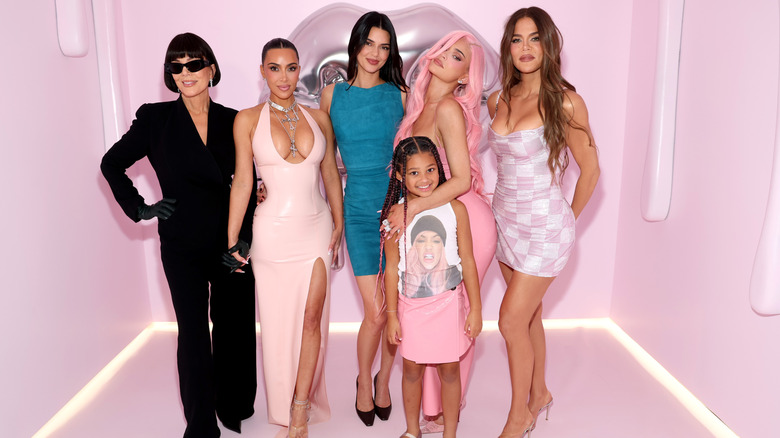 Kris Jenner, Kim Kardashian, Kendall Jenner, Kylie Kenner, Khloe Kardashian, and Stormi Webster posing together for a photograph