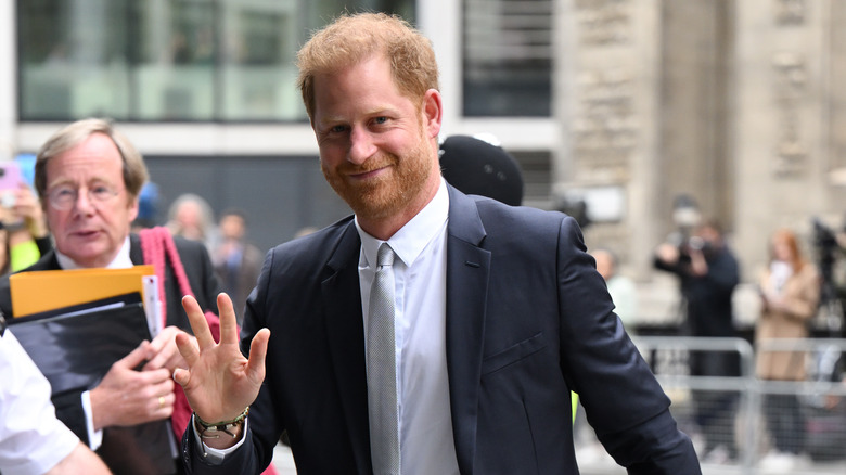 Prince Harry waving at the camera 