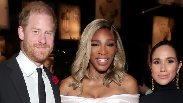 Prince Harry, Serena Williams, and Meghan Markle smiling